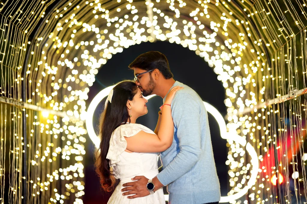 Romantic couple pose with fairy lights, perfect for a wedding photography poses checklist featuring intimate couple moments.
